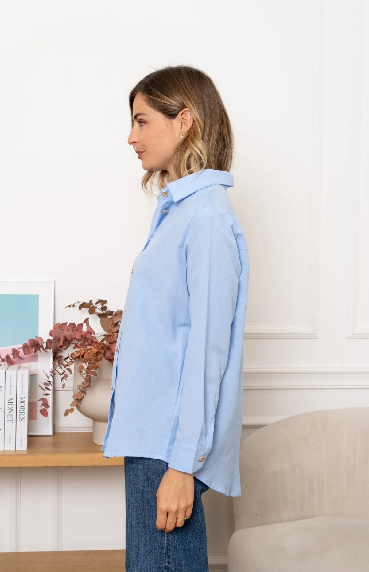 Blue Shirt With Gold Button Appliqué